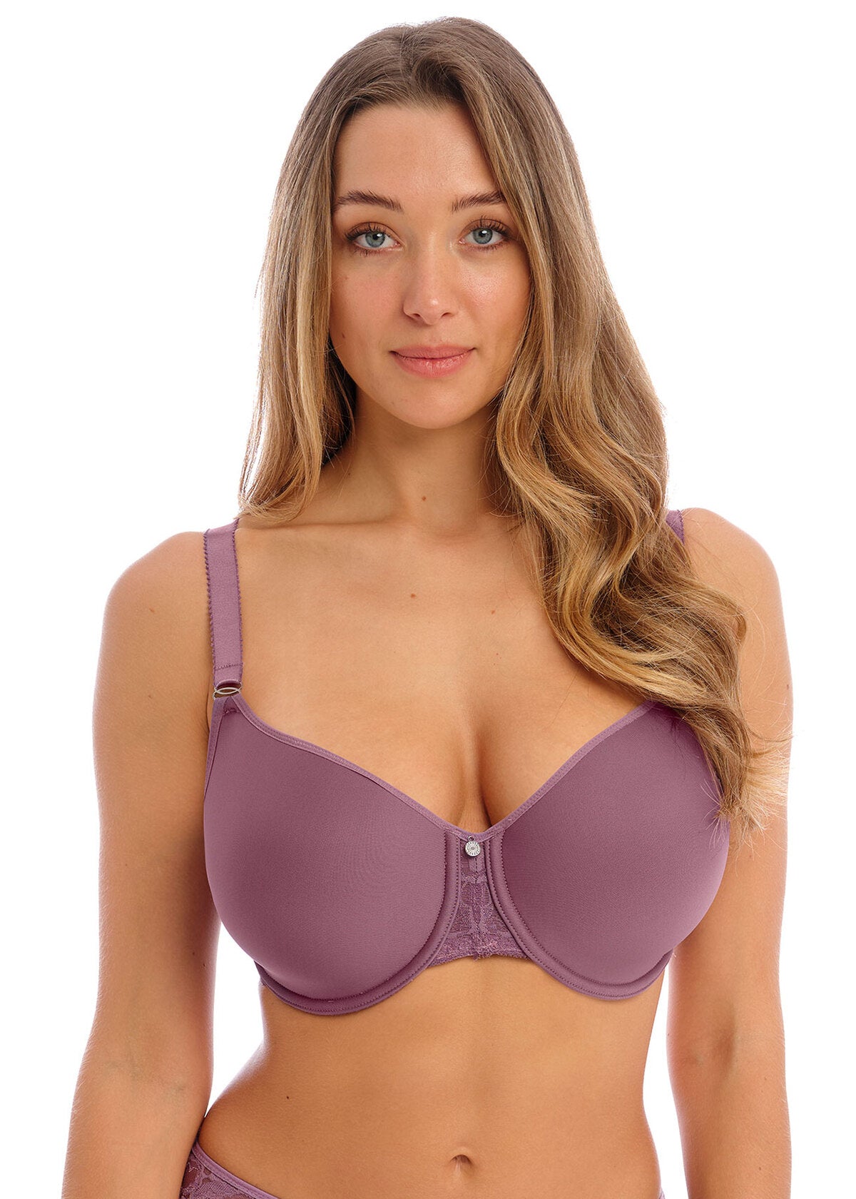 A woman wearing a pink molded cup smooth bra from Fantasie named Reflect. 